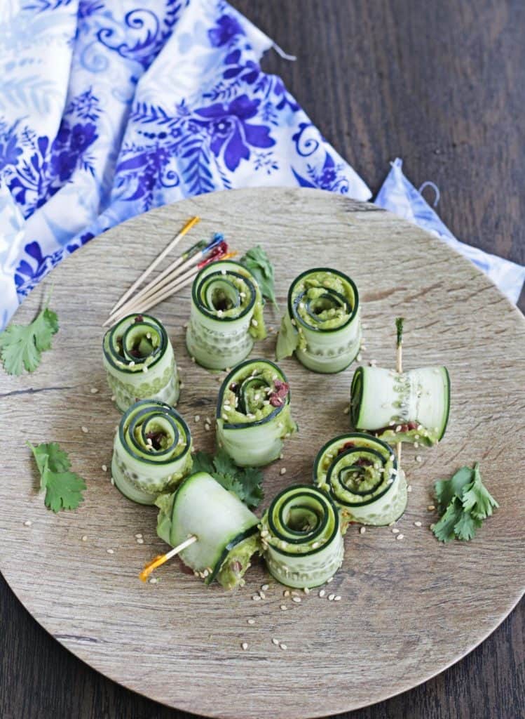 cucumber avocado rolls arranged on a plate