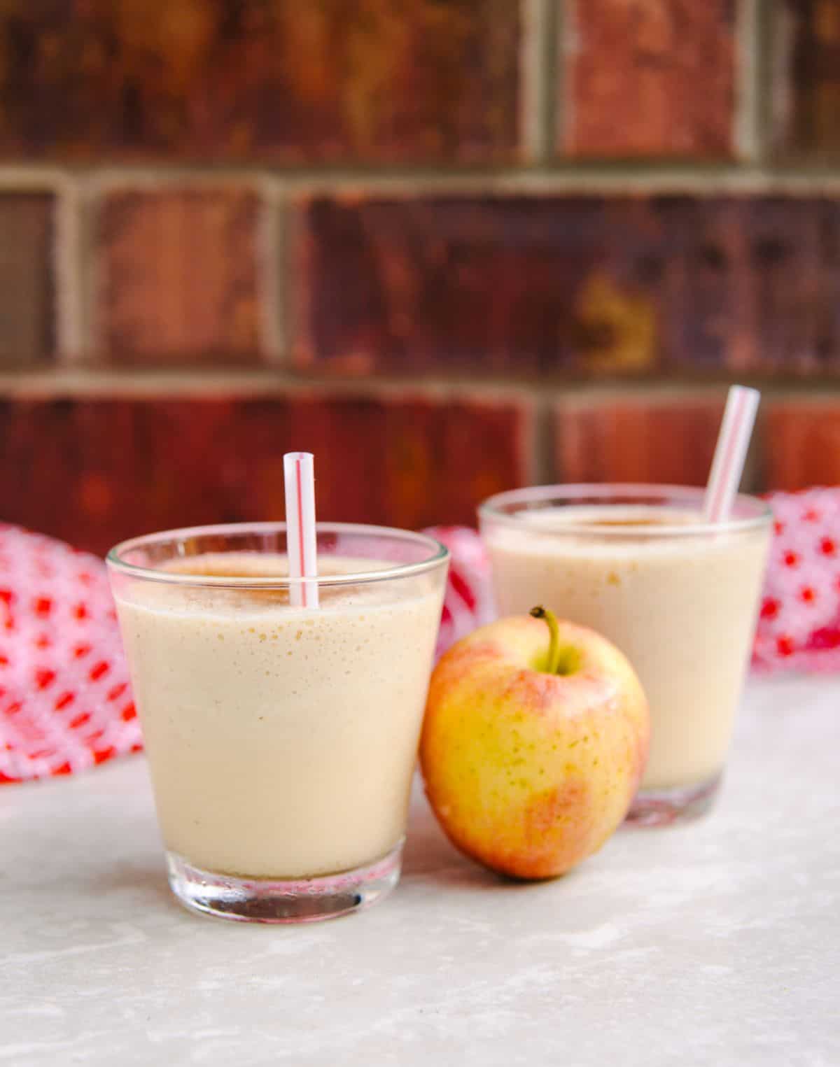 Two glasses of milkshake.