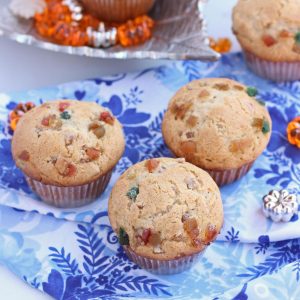 fruitcake muffins in a blue cloth.