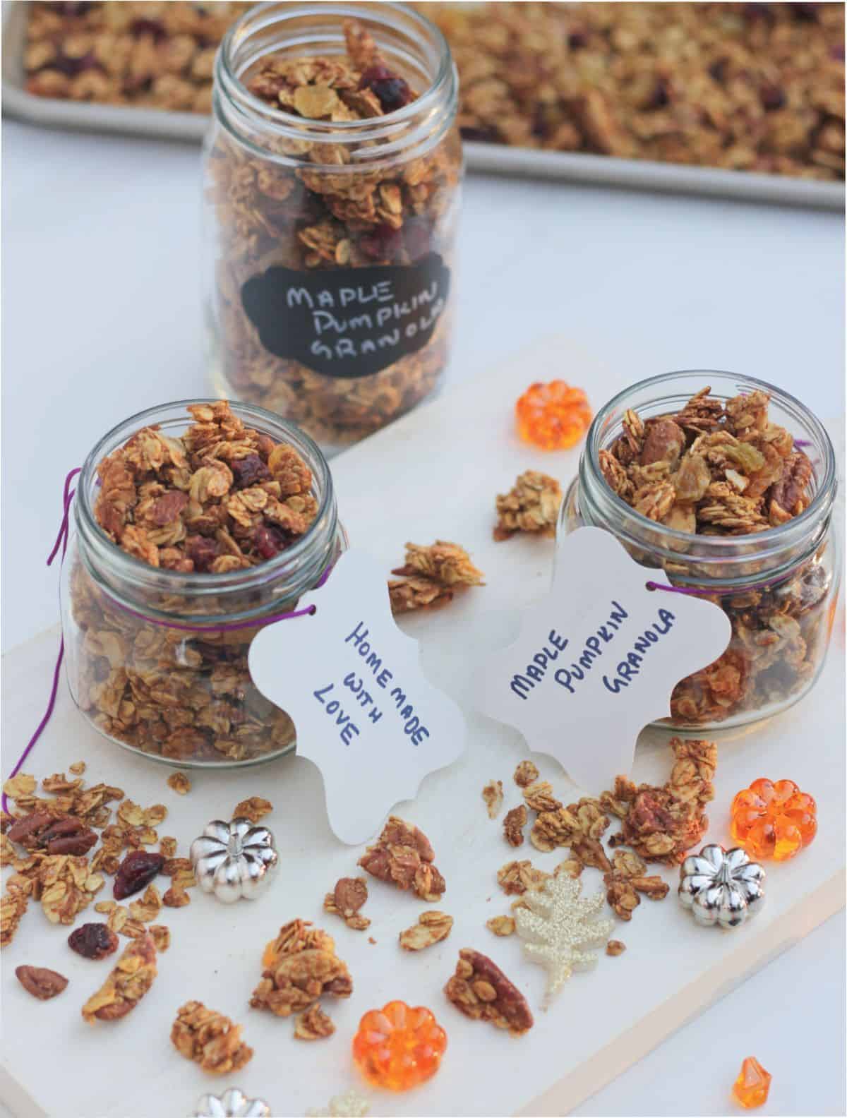 Pumpkin spiced granola in jars labeled and ready for gift.
