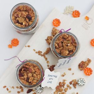 Pumpkin maple granola in jars.